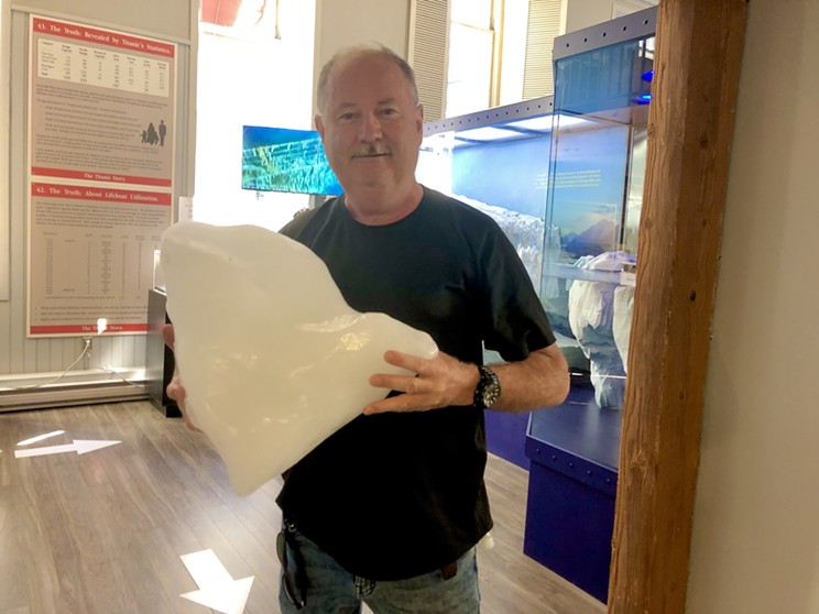 Titanic expert Larry Daley holds a chunk of iceberg he collected in Newfoundland. This ice has the "same DNA" as the ice that sank the Titanic, as they both floated down from Greenland.