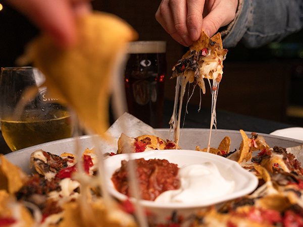 Lockdown nachos! The ultimate group pub food, now a take-out treat for five people max. IAN SELIG