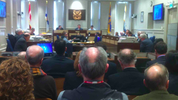 Assembled onlookers watch HRM council yesterday inside City Hall.