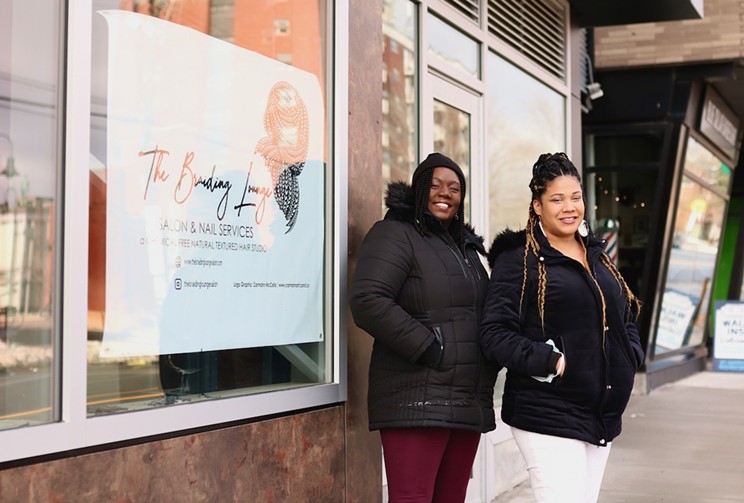 Tara Taylor, left, and Braids by Tasha founder Natasha Stephenson outside The Braiding Lounge at 2300 Gottingen Street.