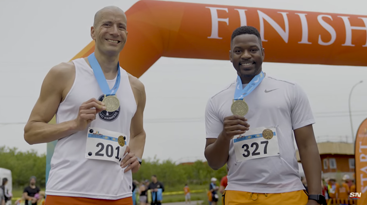 Jarvis Googoo and Sportsnet journalist Donnovan Bennett running the 5km Ulnooweg Summer Solstice Run in 2023.