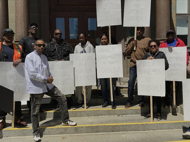 City hall employees protest racism in the workplace