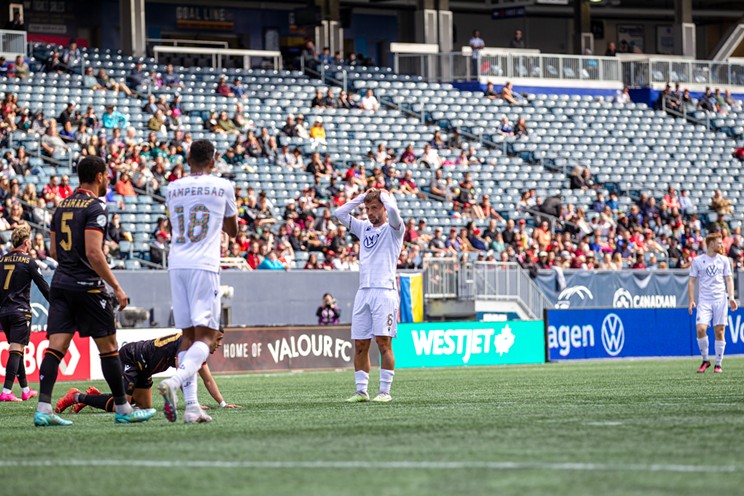 HFX Wanderers FC midfielder Lorenzo Callegari holds his hands to his head during the Wanderers' May 6, 2023 match against Winnipeg's Valour FC. The clubs tied nil-nil.