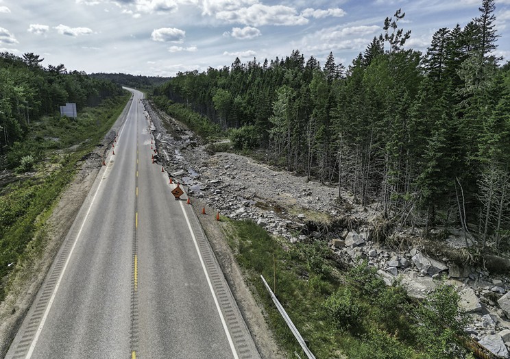 Road damage caused by floodwater along Highway 103 near Chester, seen on Sunday, July 23, 2023.