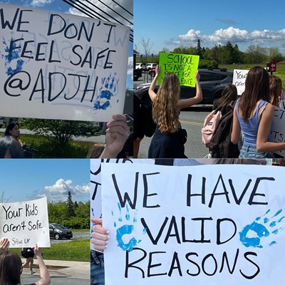 “We don’t feel safe,” read students’ posters at walkout Friday morning